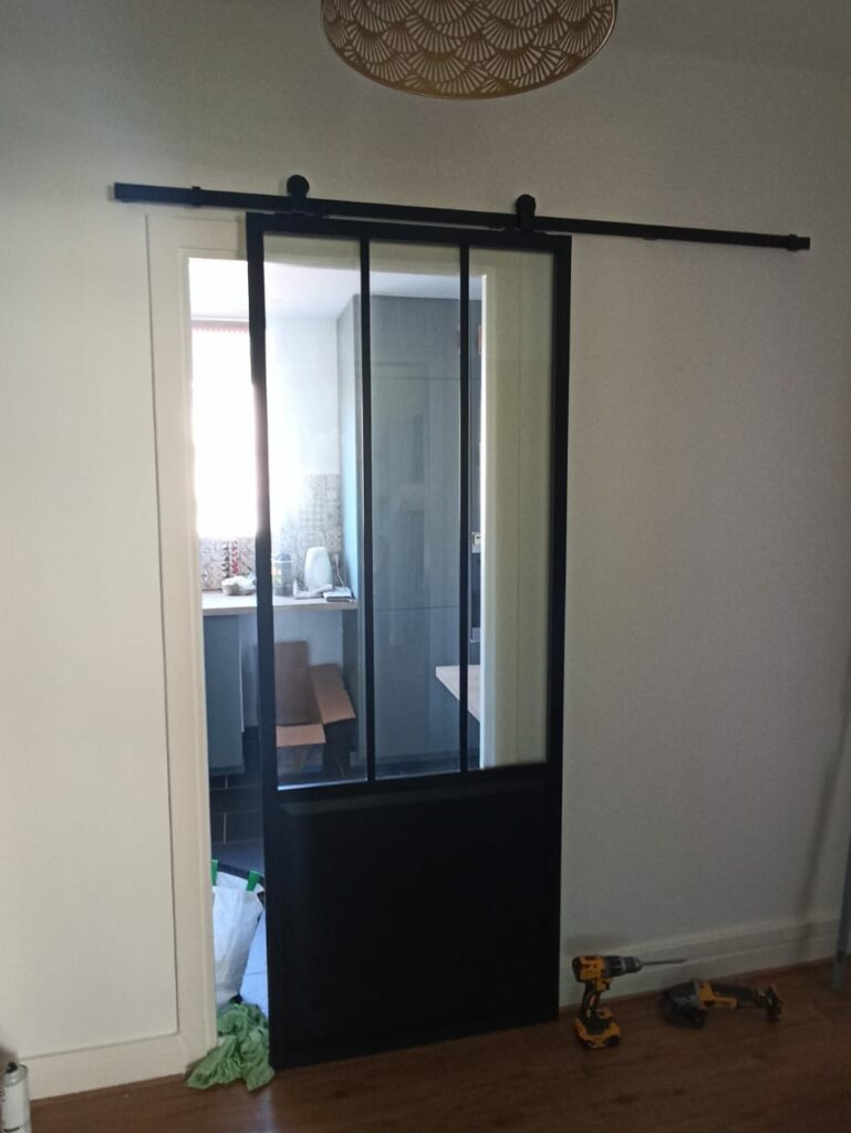 Installation d'une porte coulissante